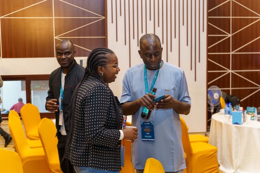 Delegates networking on the summit floor